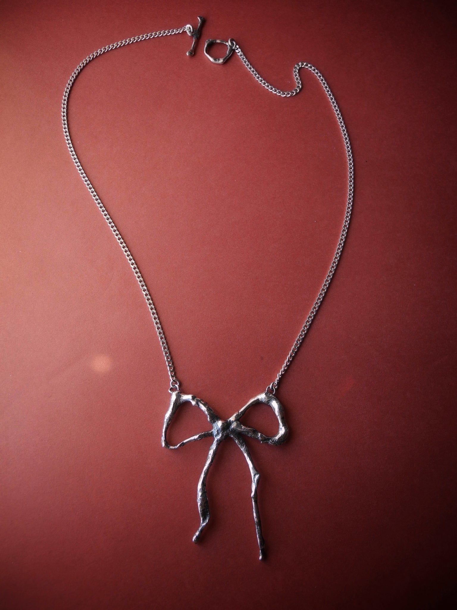 Weathered Bow Necklace