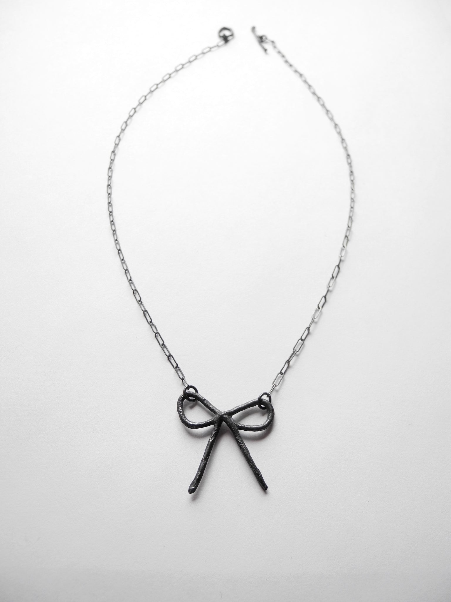 Imperfect Bow necklace